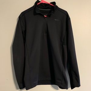 Men’s Black Nike “Therma-Fit” Quarter Zip.